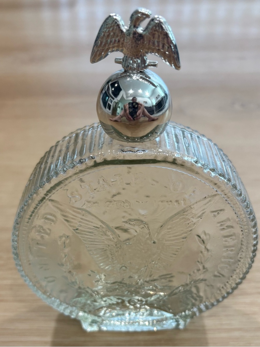 Avon Liberty Dollar bottle with Eagle cap